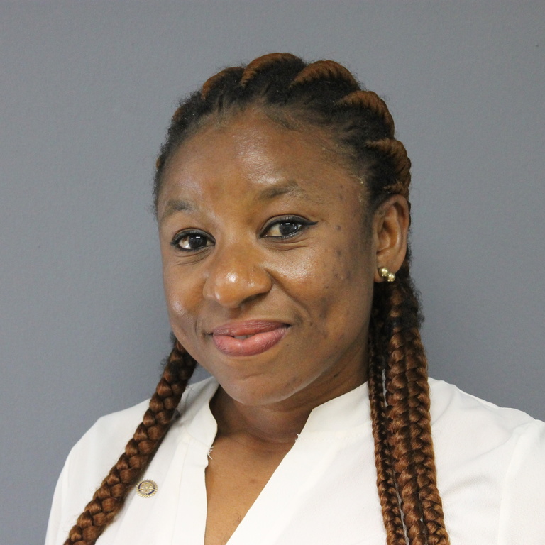 young black woman with braids, wearing white shirt