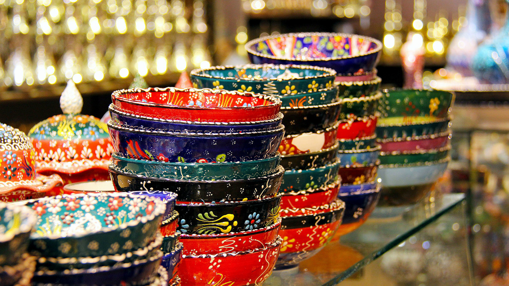 Stacks of highly colorful and decorated bowls